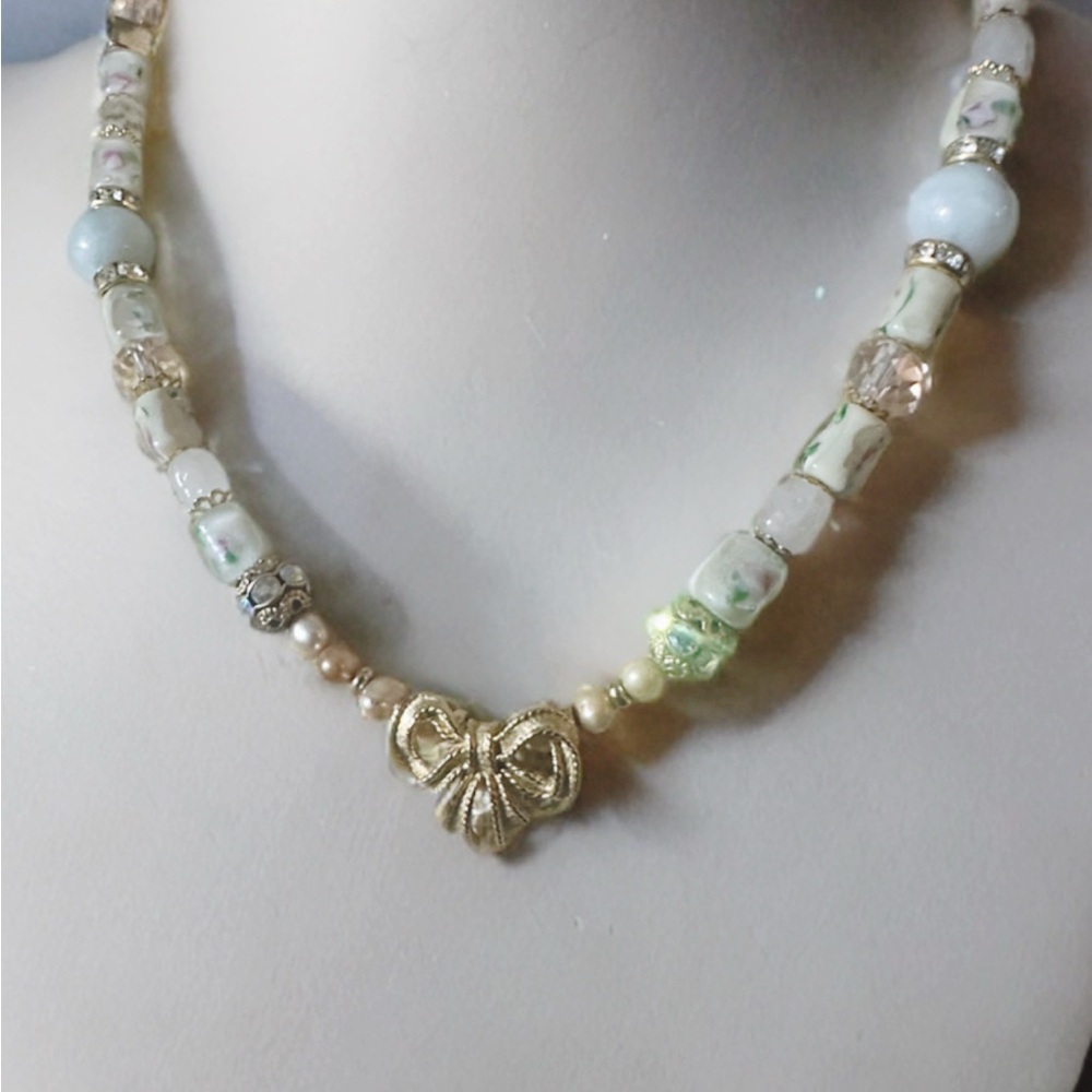 Genuine pearls, jade, vintage floral pink glass, and vintage broach